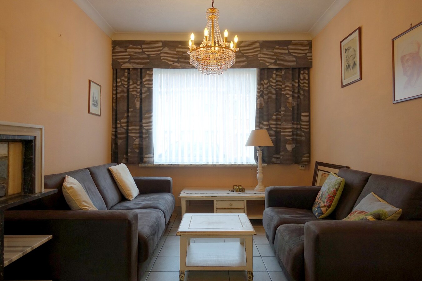 Rustig gelegen instapklare rijwoning met nabij gelegen garagebox 