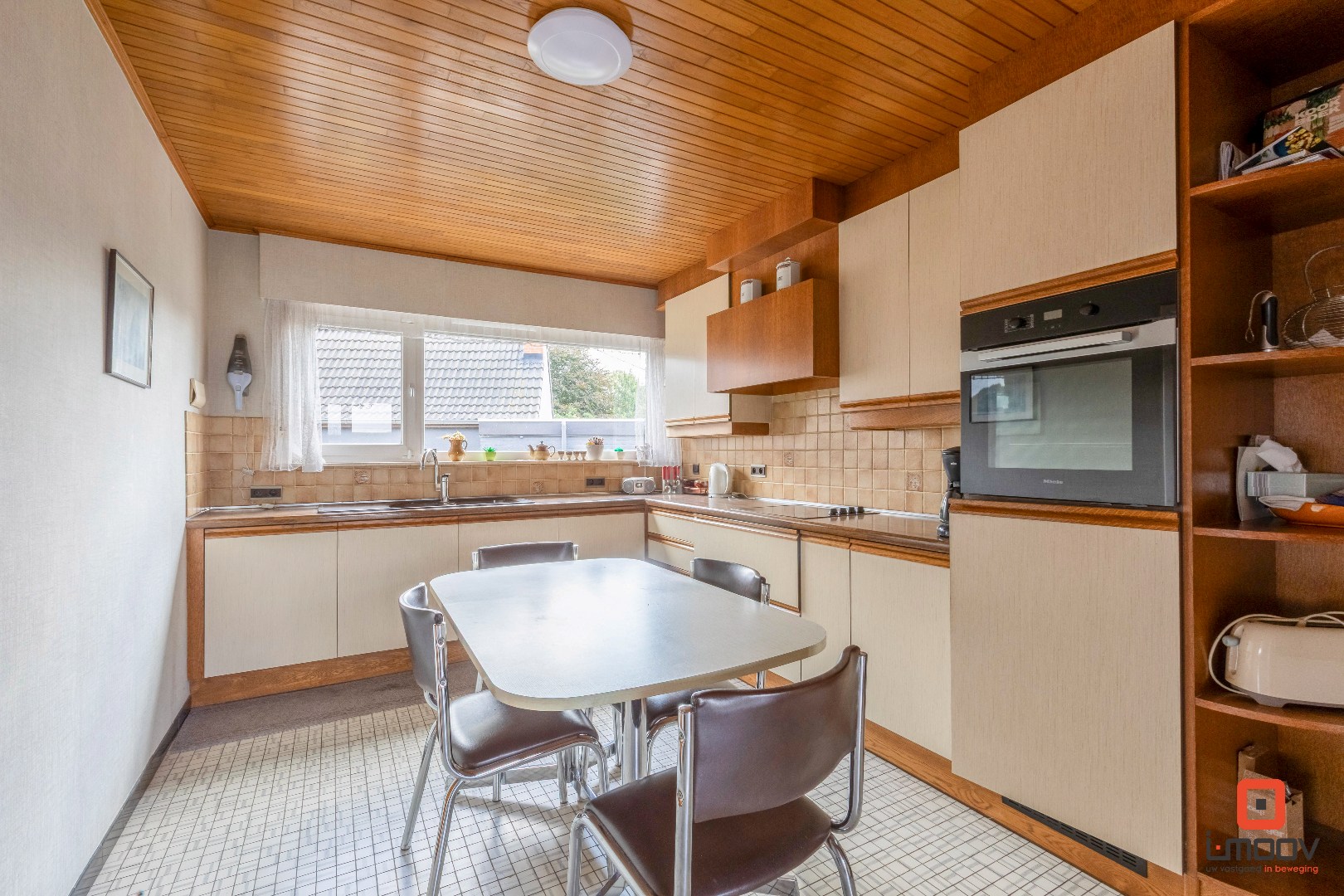 Charmante bungalow met potentieel in rustige buurt te Evergem 