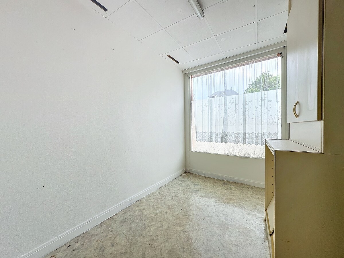 Te renoveren woning met 3 kamers en tuin centrum Herzele 