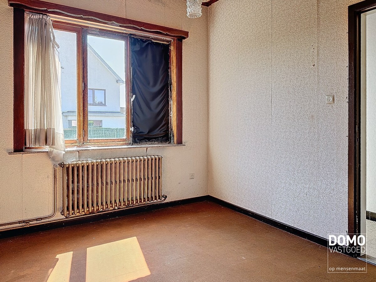 Te renoveren karaktervolle open bebouwing met tuin - mogelijkheid tot creëren extra half open bebouwing 