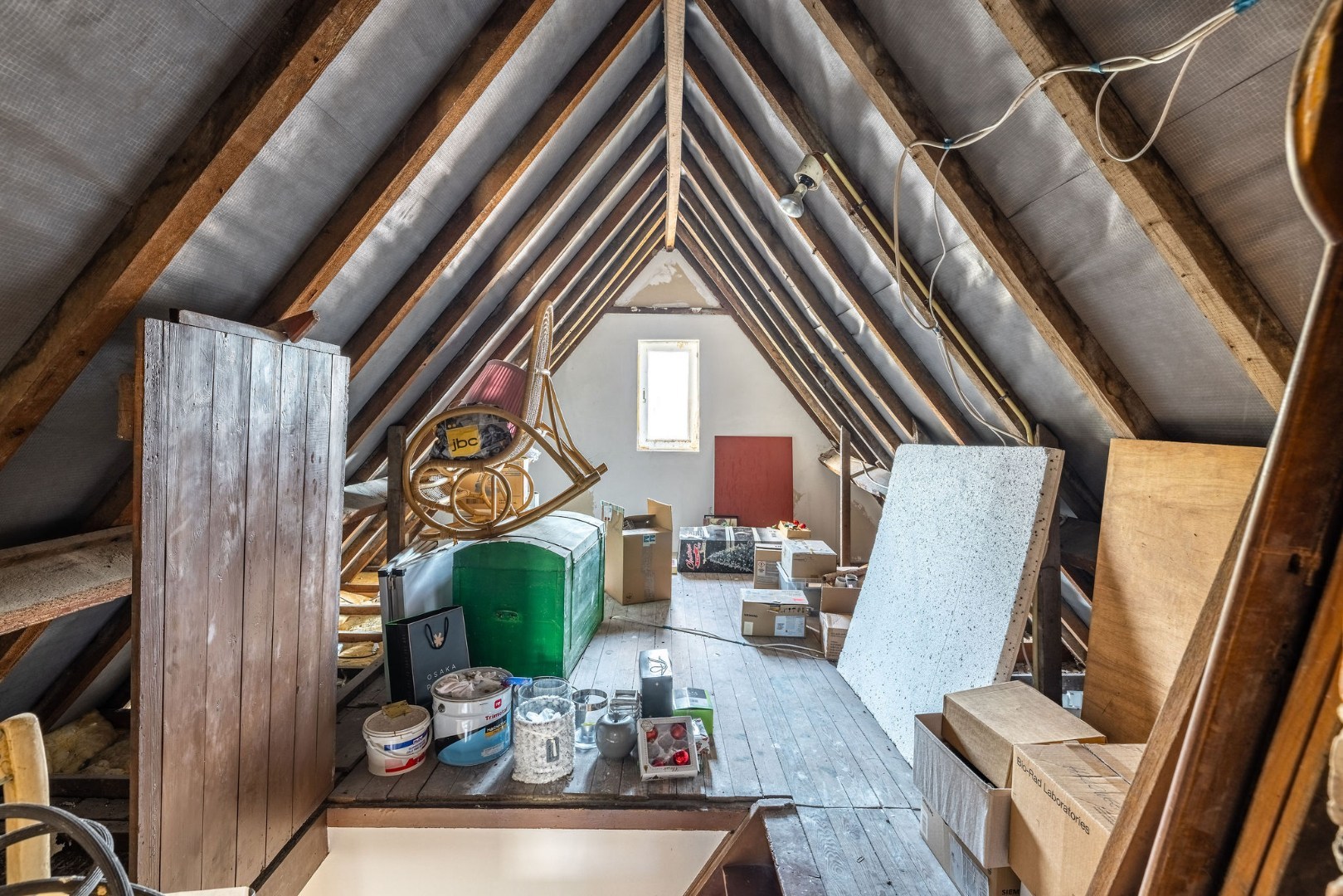 Authentieke woning met zonnige tuin, garage en bouwgrond 