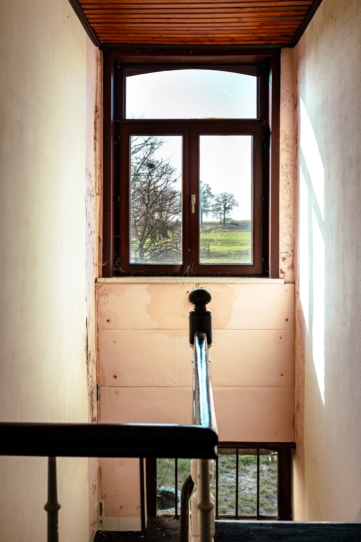 Te renoveren / herop te bouwen pand op 1.041 m² met zicht op achterliggende weilanden te Ronsele 