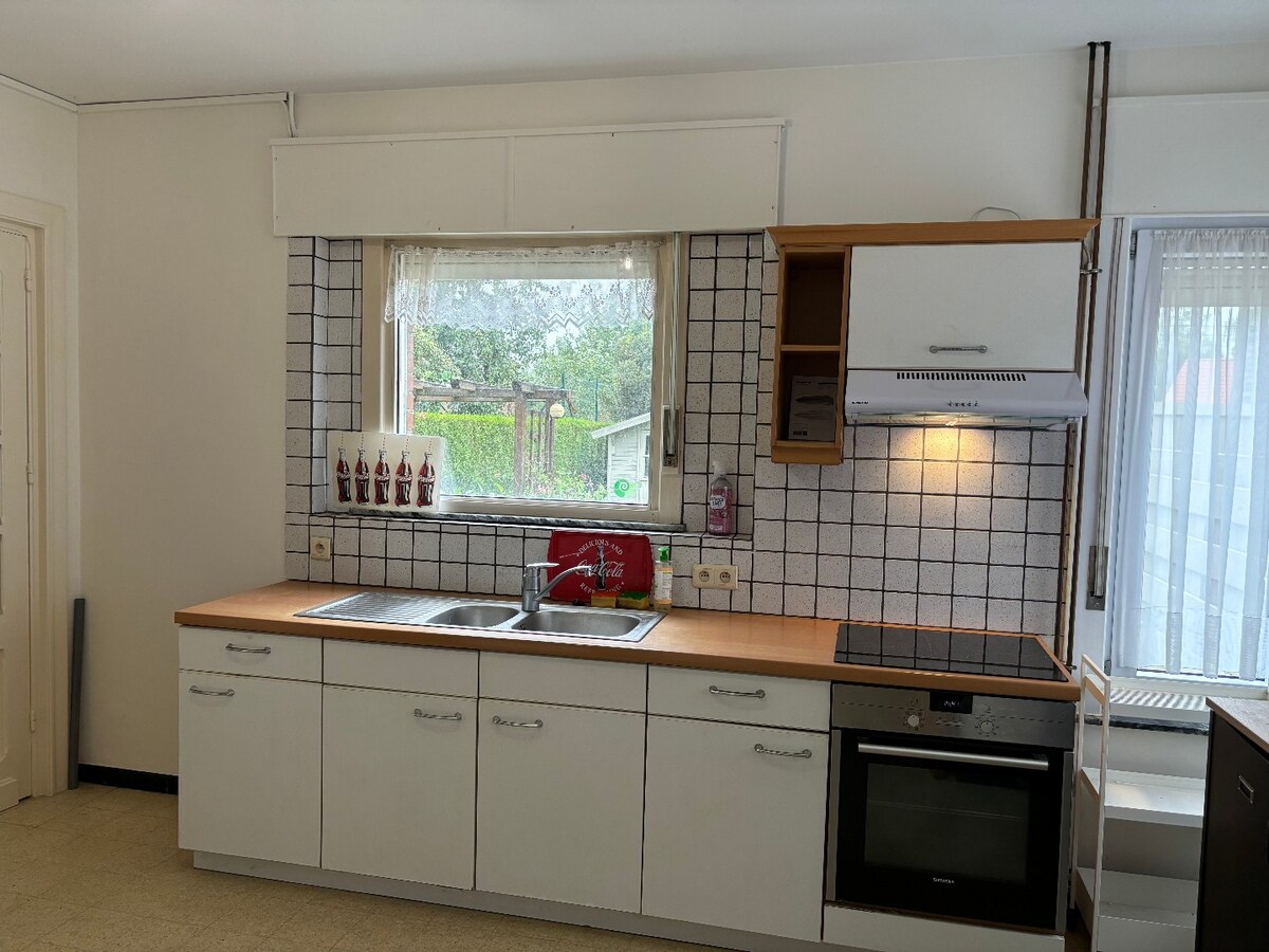 Charmante maison 4 façades avec jardin et garage 