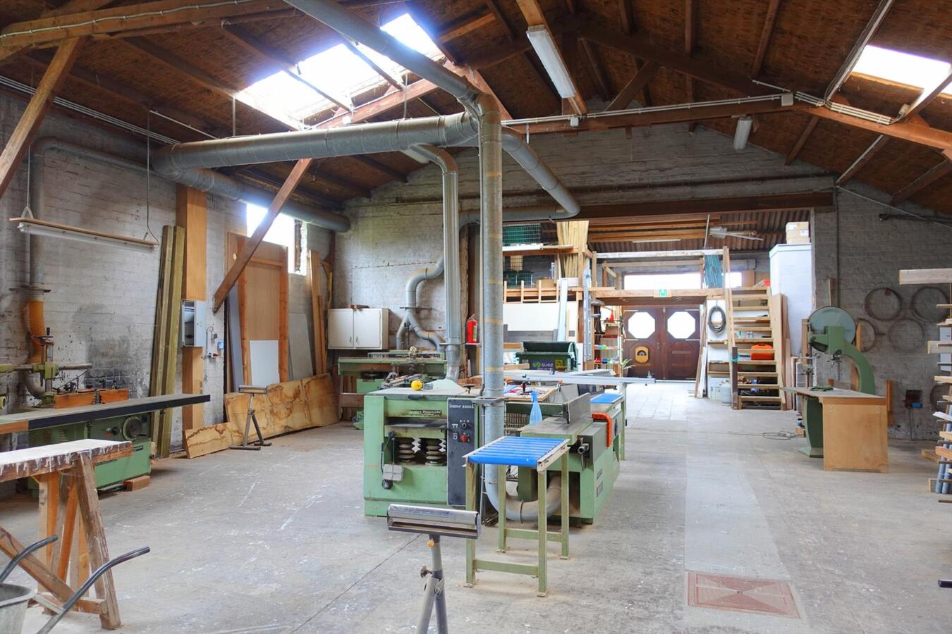 Uitzonderlijke woonst met werkplaats 