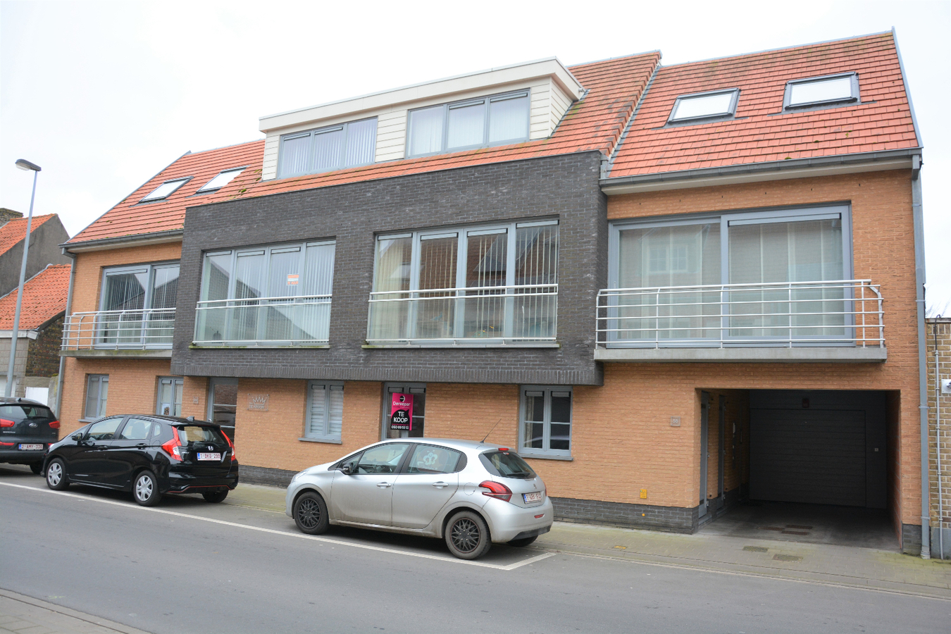 Gelijkvloers appartement met tuin en garage 