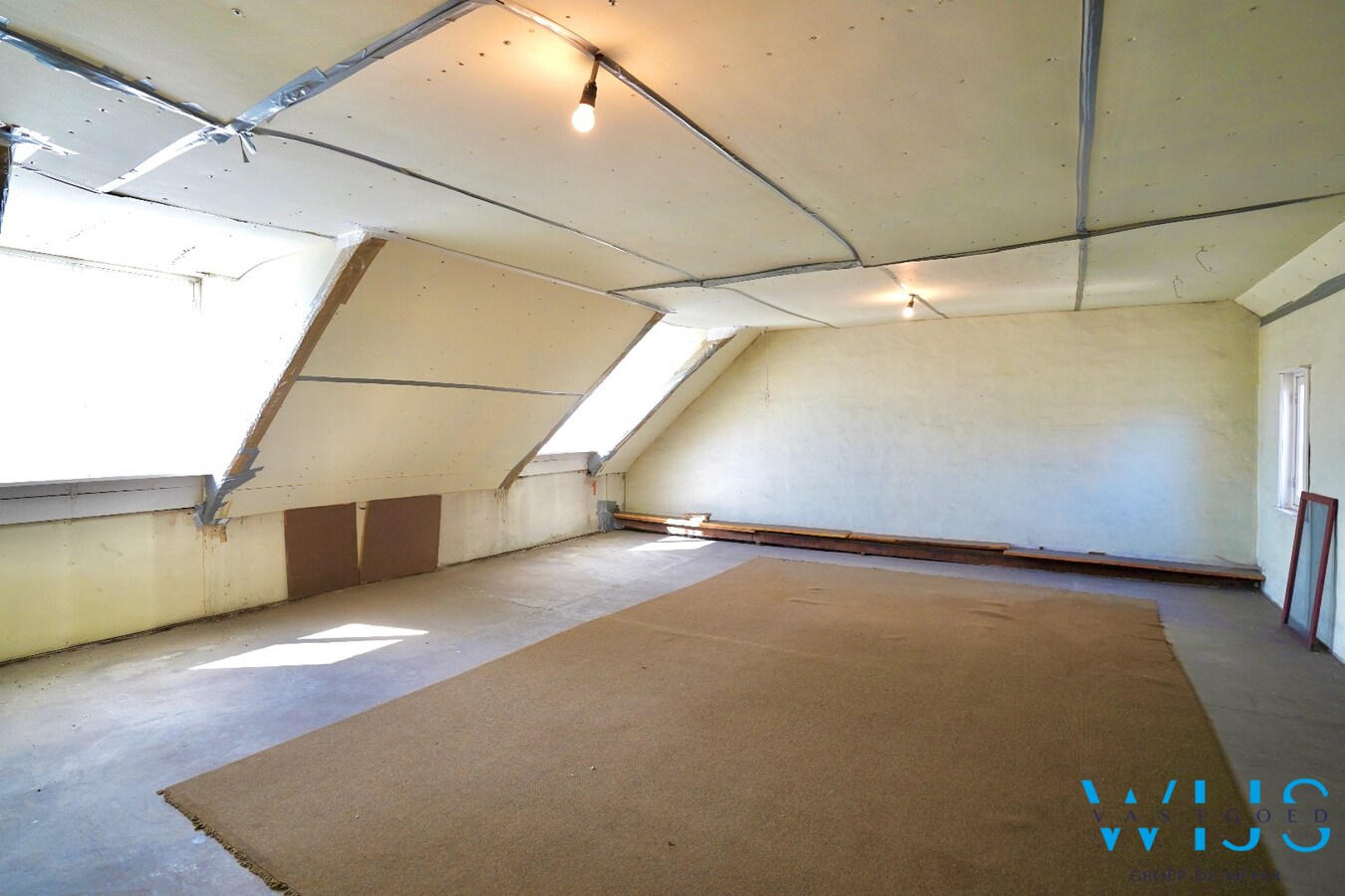 Karaktervolle en instapklare woning met uitzonderlijk perceel van 1.445 m² in hartje Ertvelde 