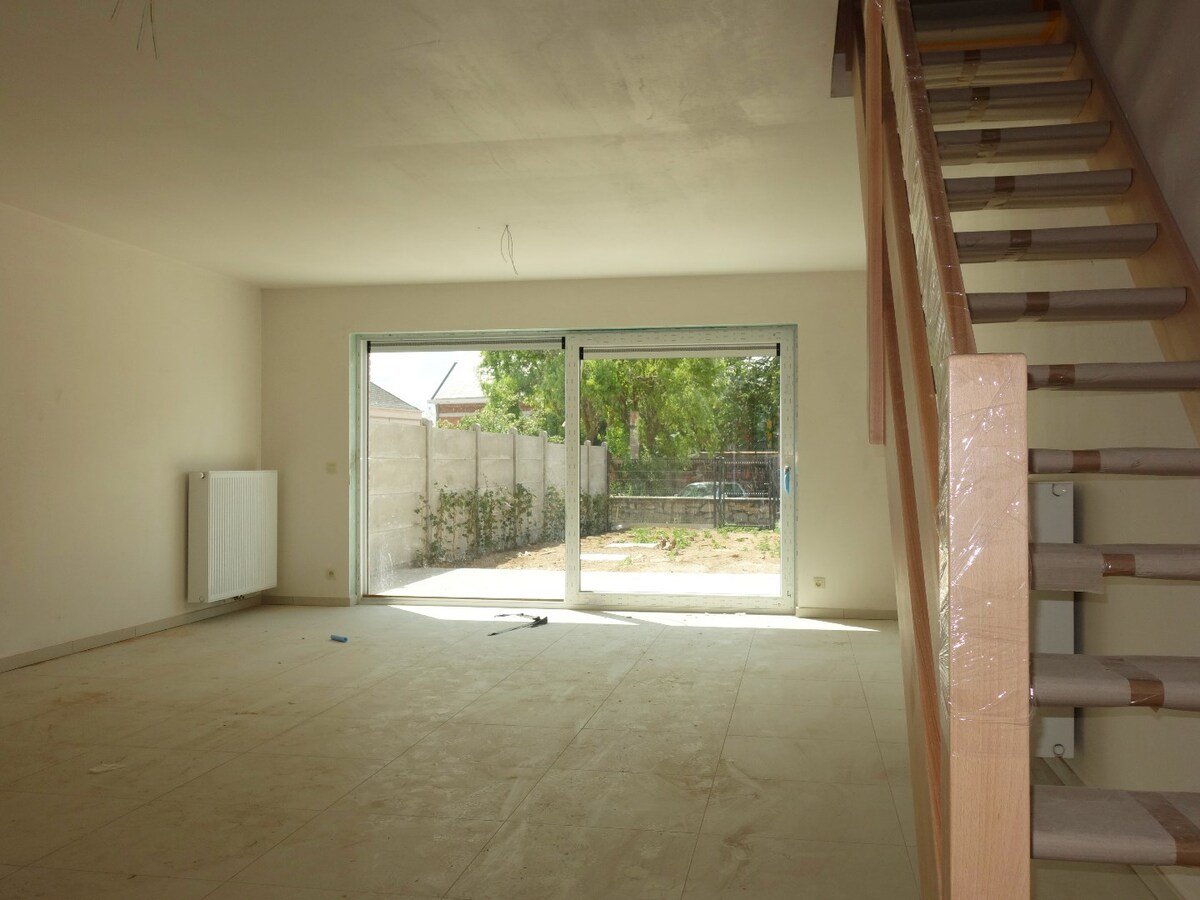 Construction moderne en plein coeur du village de Pecq ! 