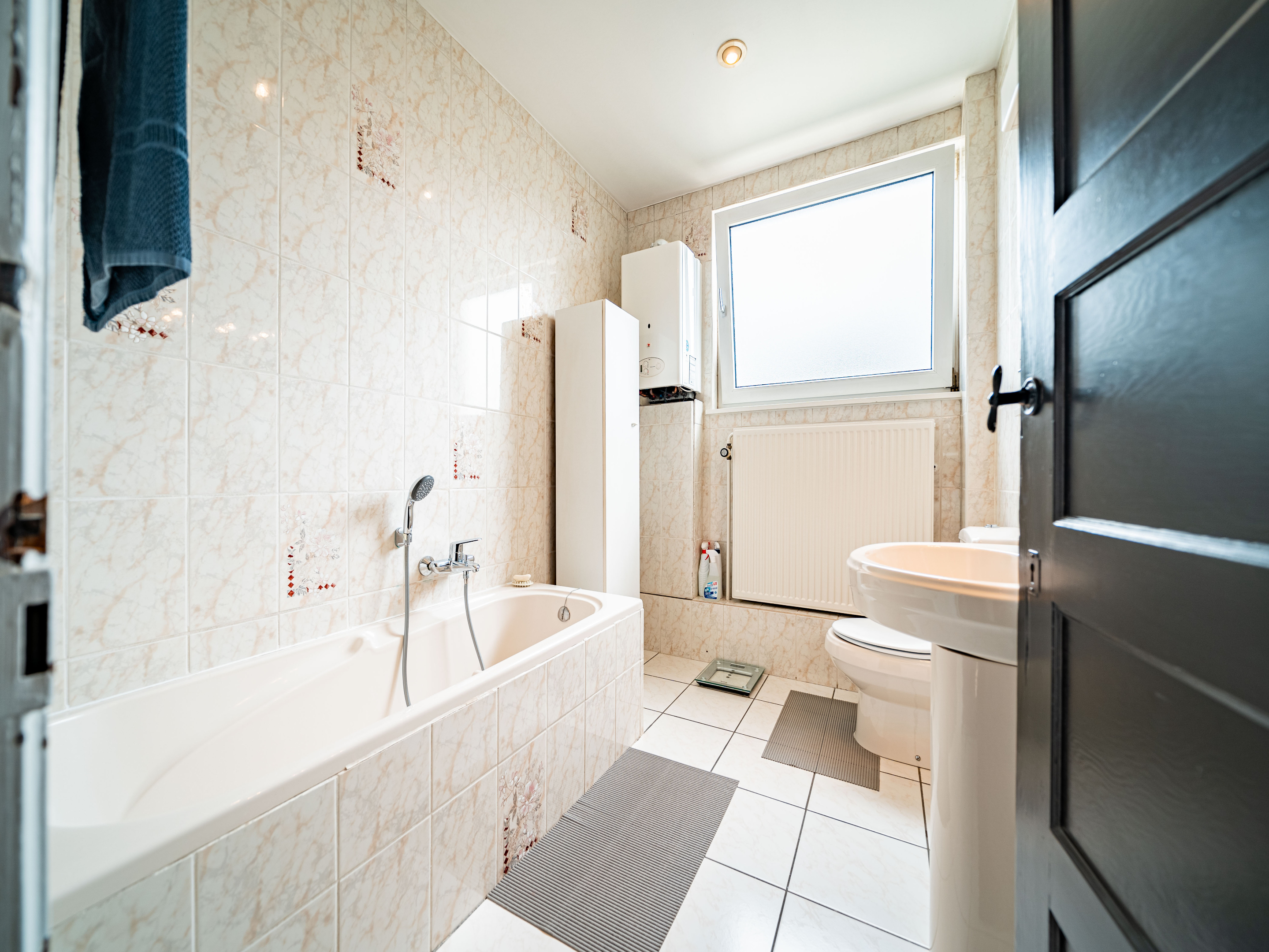 Uitzonderlijk goed onderhouden instapklare woning met 3 slaapkamers en tuin 