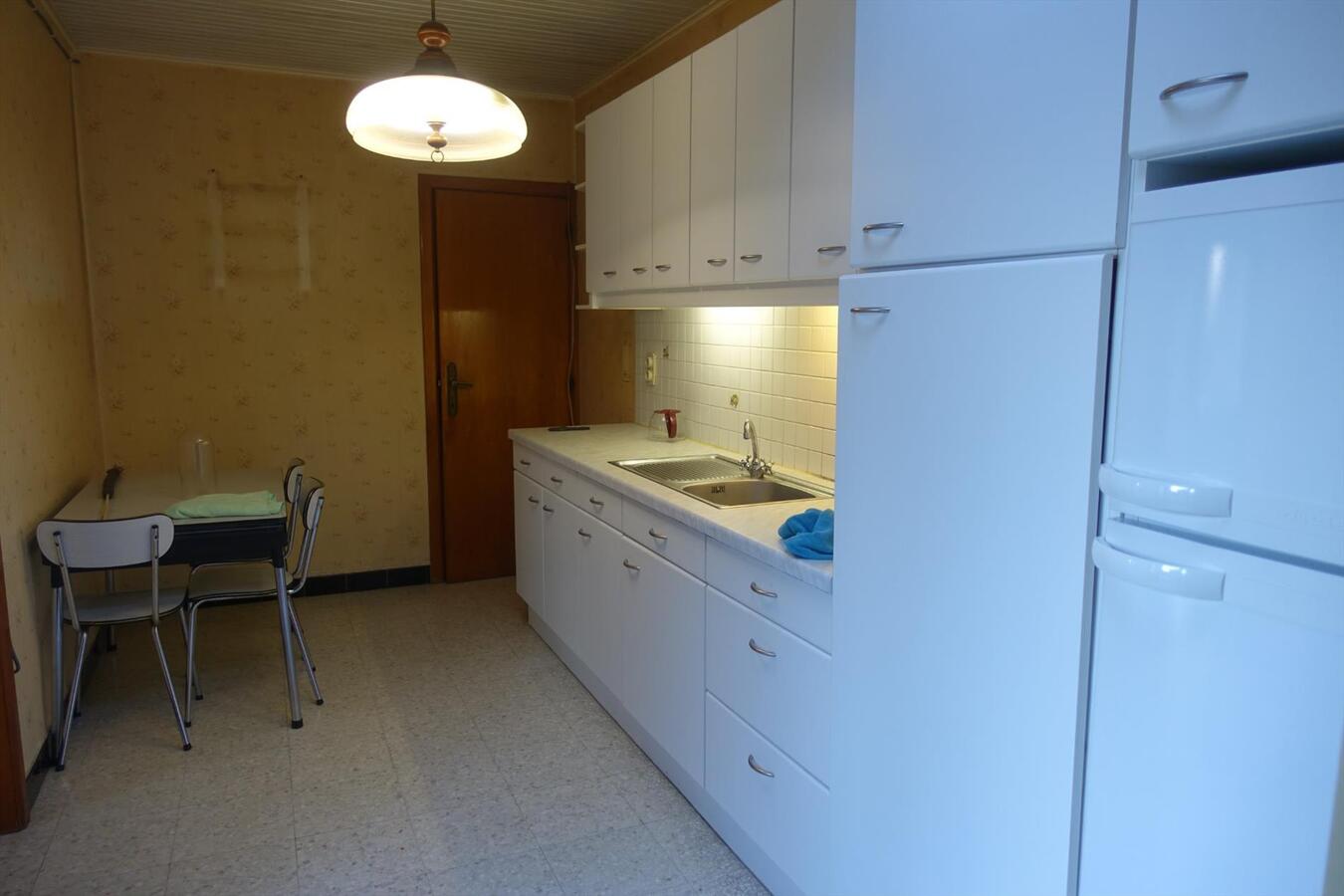 Degelijke halfopen woning met garage 