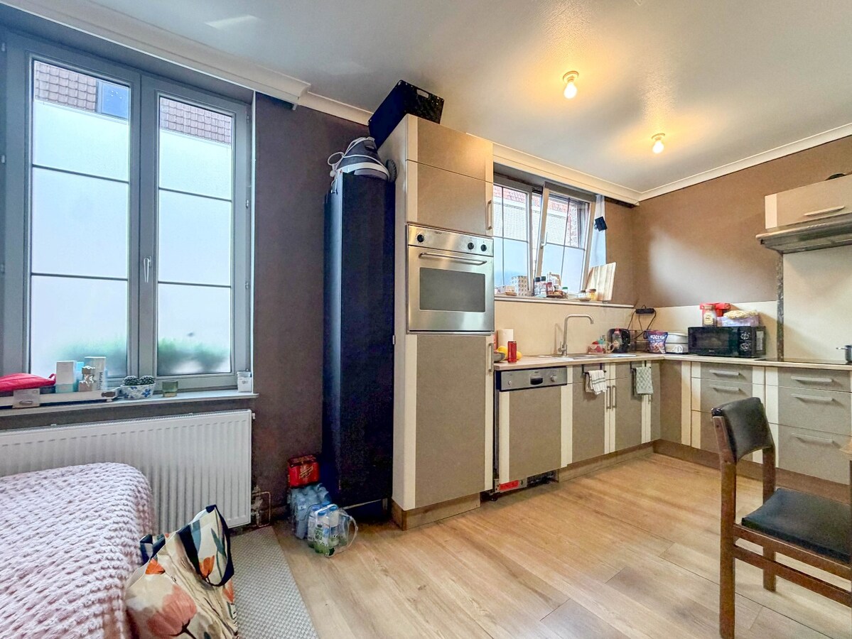 UNIEK en ruime KARAKTERVOLLE  woning met handelspand nabij de Grote Markt ! 