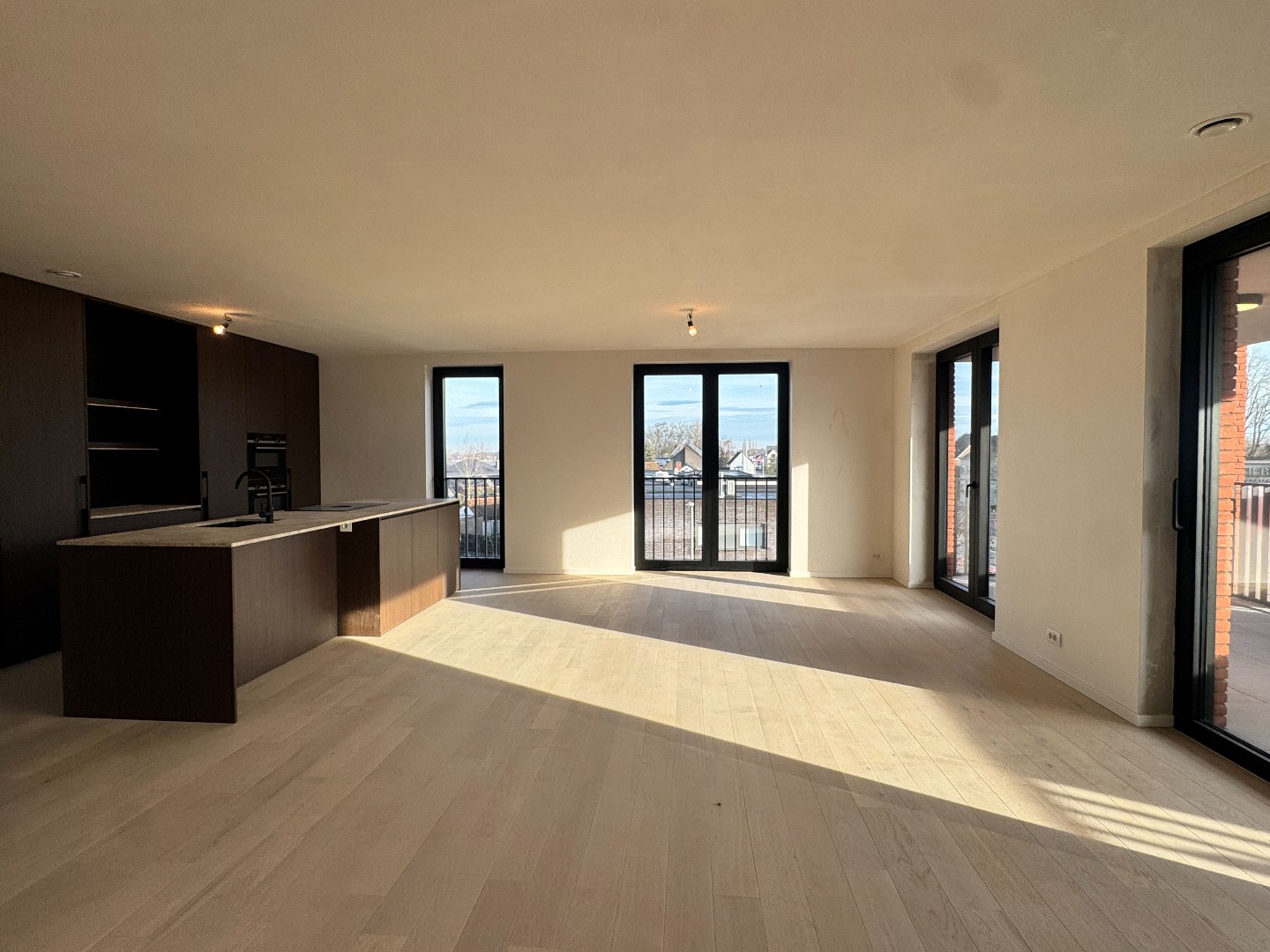 Nieuwbouwappartement met twee slaapkamers, terras en ondergrondse autostaanplaats te koop in Zulte 