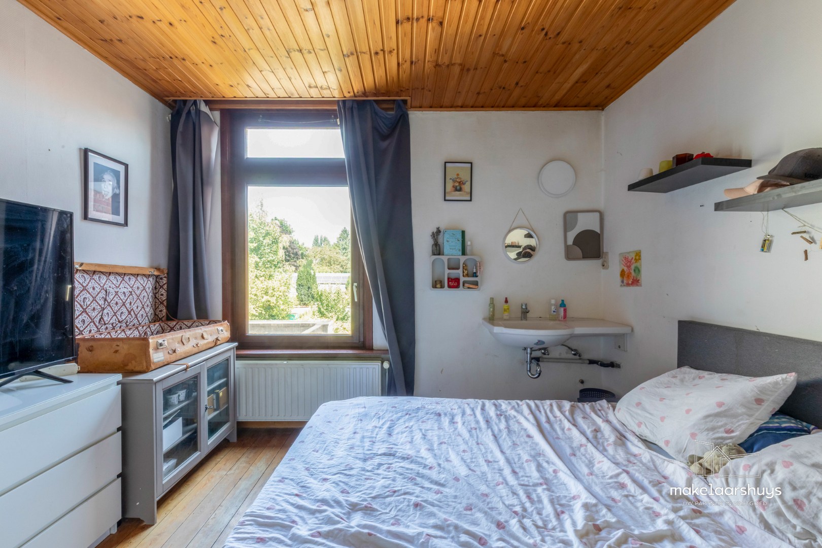 Ruime woning met 4 slpk en aangename tuin te Sint-Amandsberg 