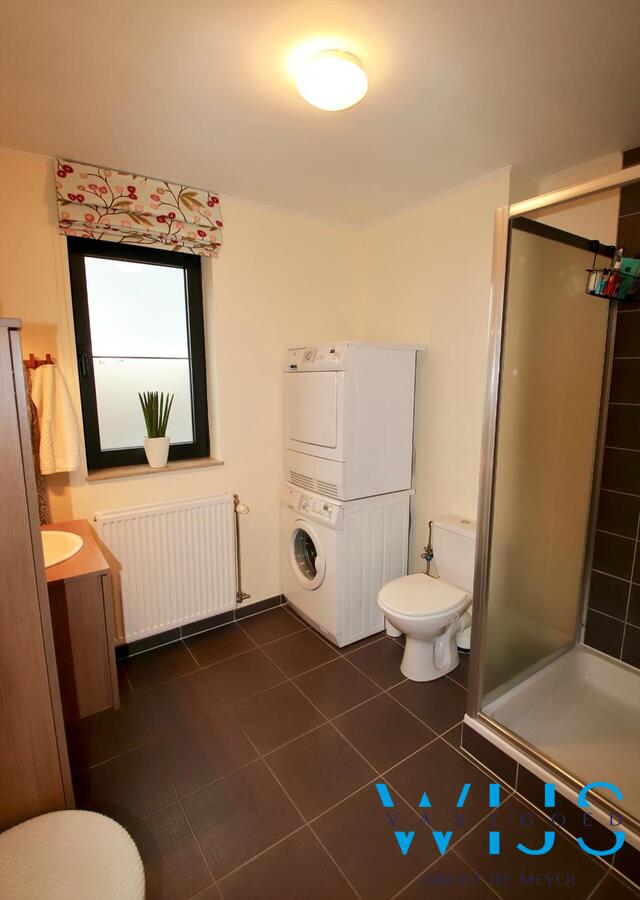 Charmant instapklaar tweeslaapkamer appartement in centrum Ertvelde! 