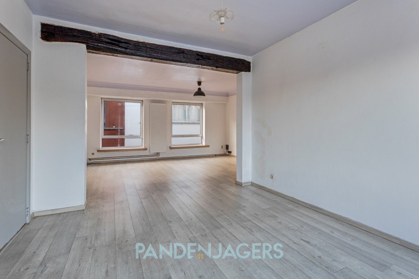 Handelshuis met winkelgedeelte en appartement te Duffel 