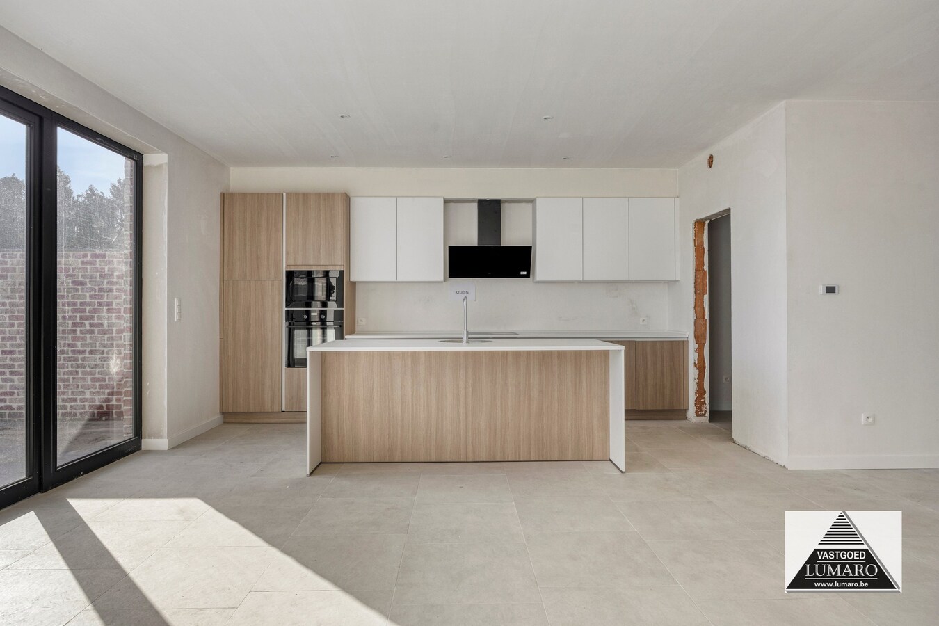 Nieuw gelijkvloers appartement met terras en tuintje 