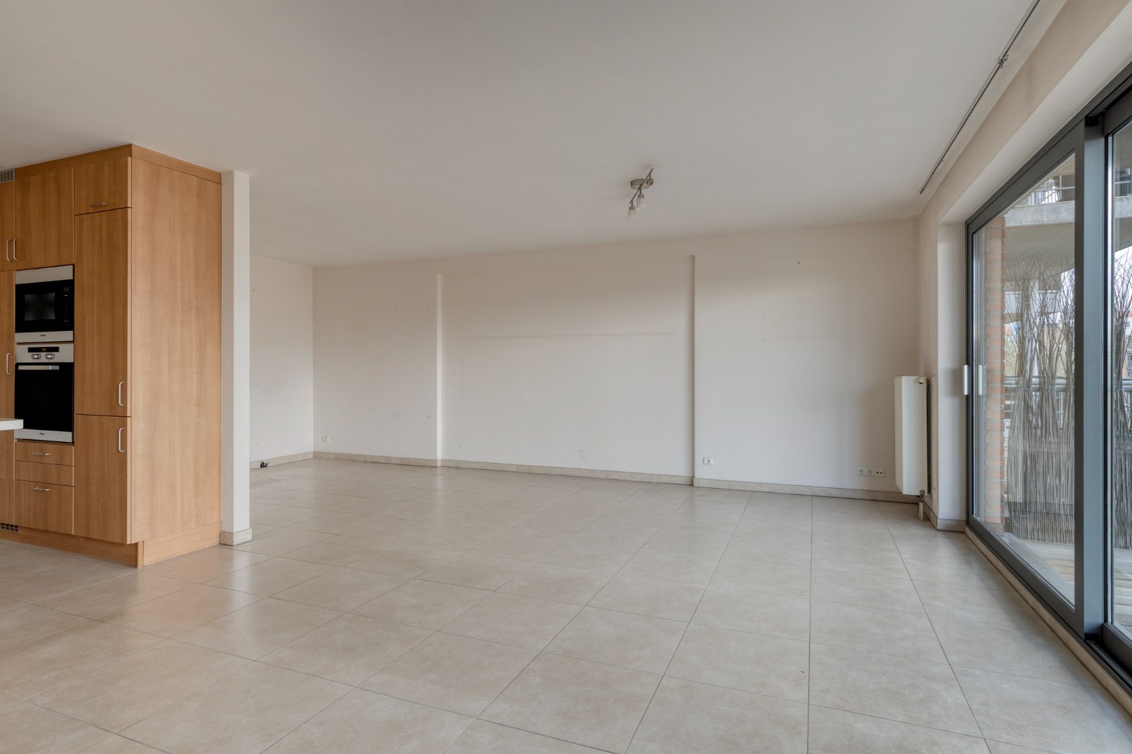 Appartement met 2 slaapkamers, ruim terras en garagebox in Leuven! – EPC 92 kWh/m² – bewoonbare opp. 94m² 