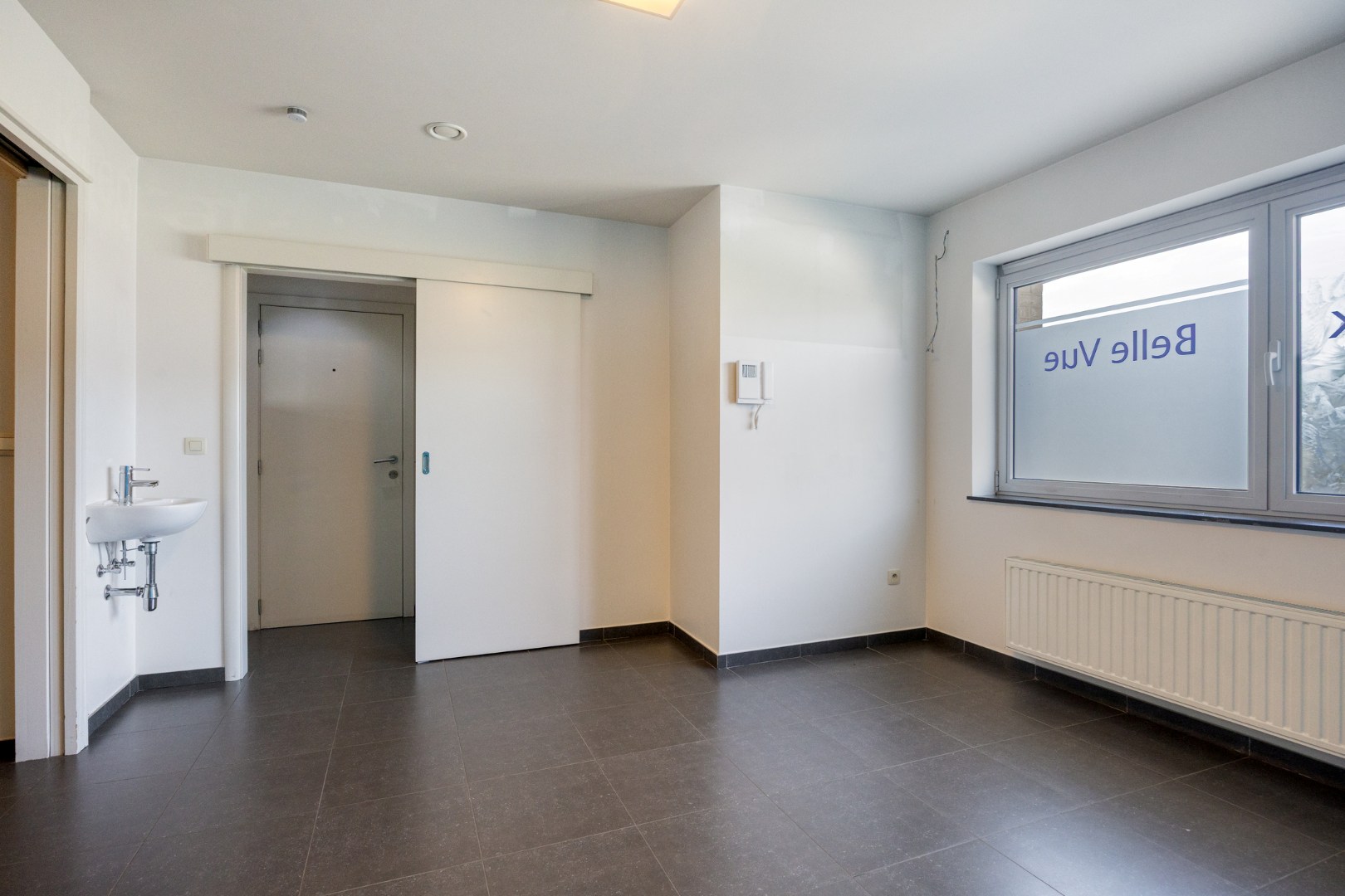 Super gelegen handelspand met buitenruimte in Kessel-Lo 