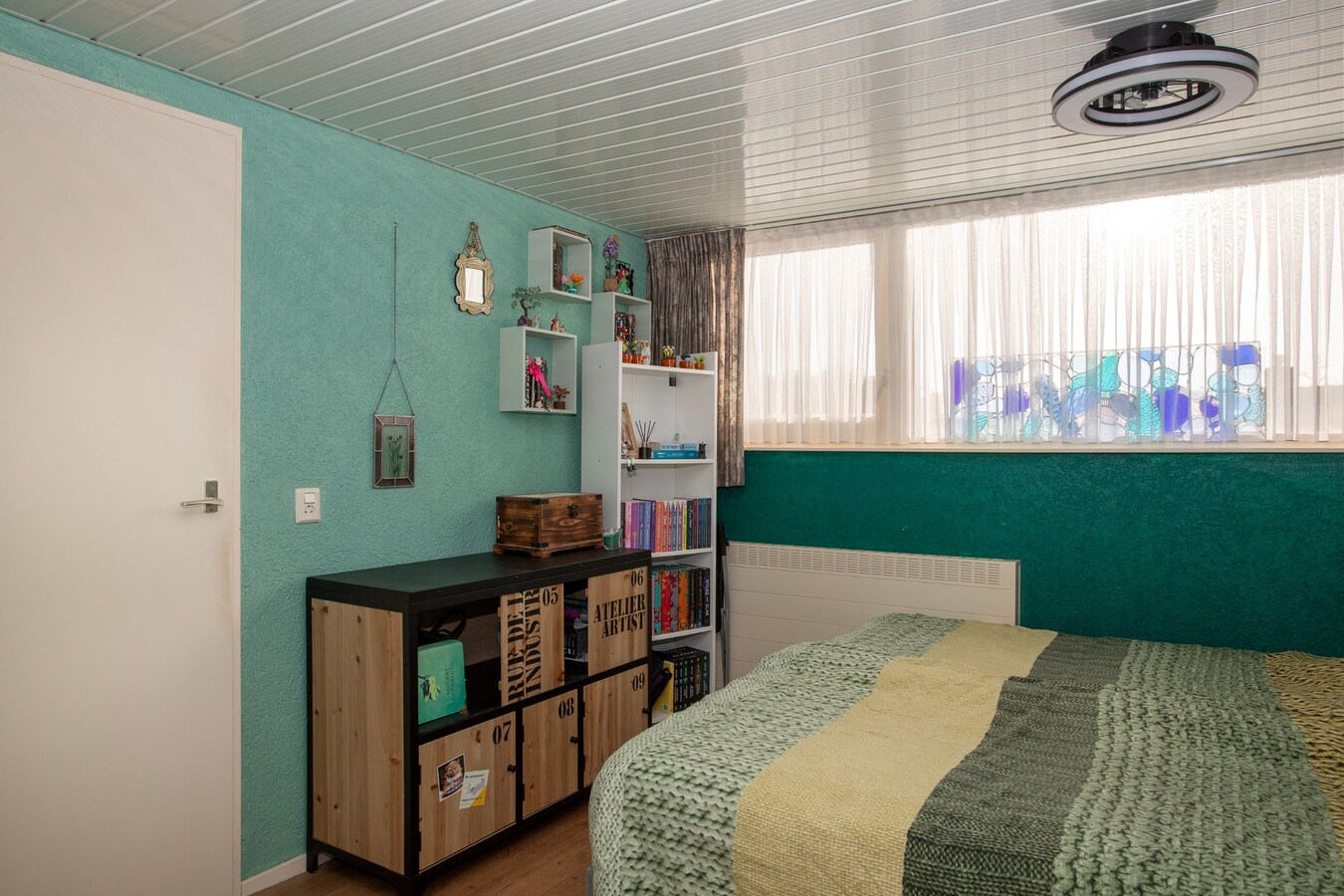 Ruime gezinswoning met royale garage en prachtige tuin 