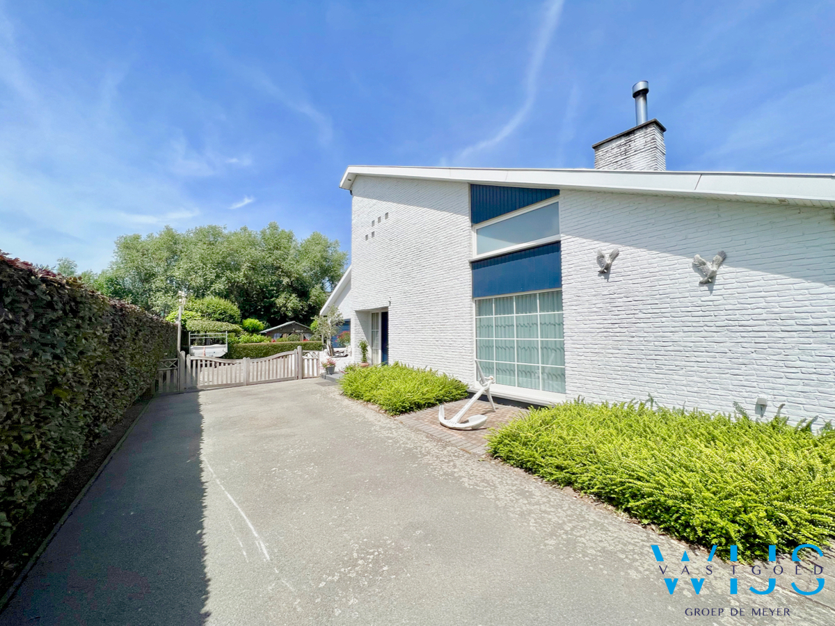 Prachtige alleenstaande woning op een aangenaam perceel van 1060m² in Doornzele ! 