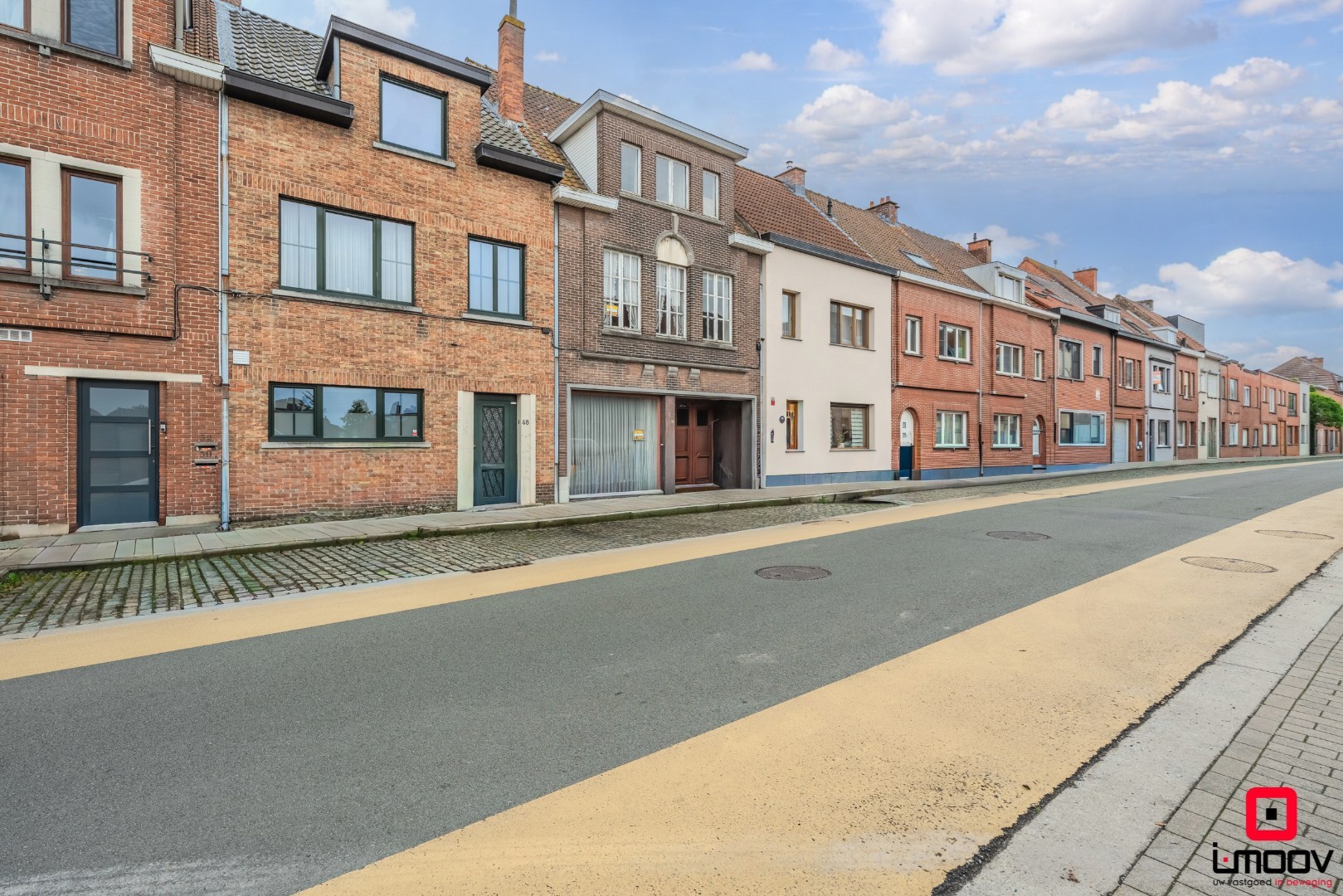 Karaktervolle voormalige apotheekwoning met groene tuin aan het water nabij UZ Gent 