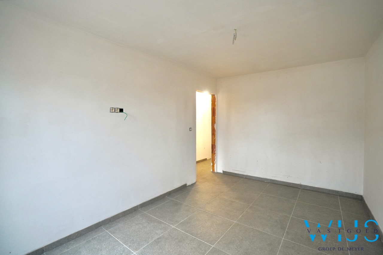 Drieslaapkamer appartement met garage in hartje Ertvelde ! 