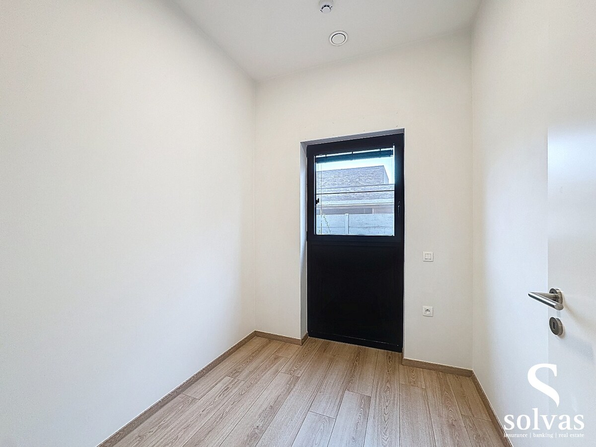 Gelijkvloers appartement met 2 slaapkamer, terras en tuintje 