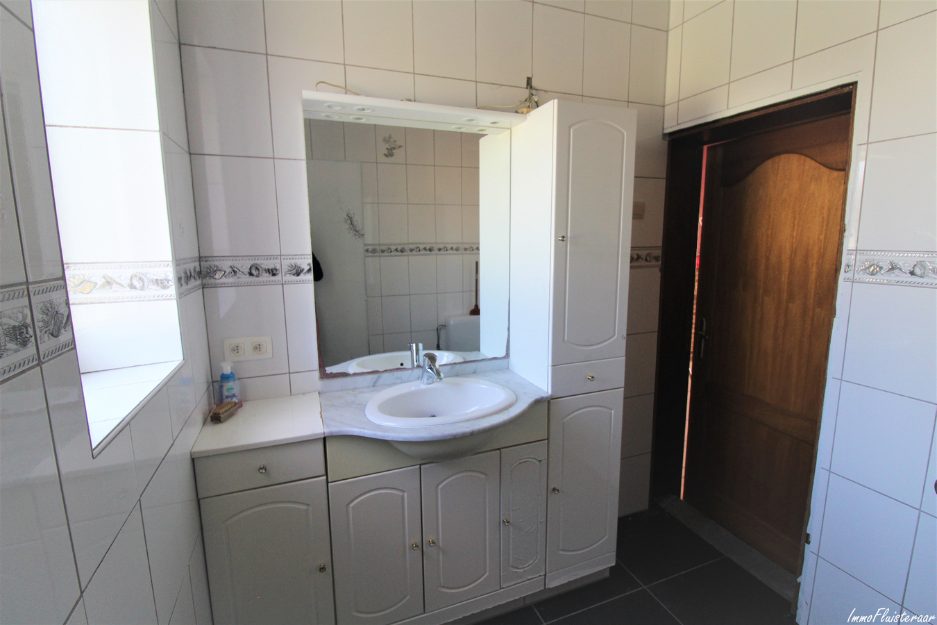 Maison à rénover (1900-1950) avec annexes et prés sur plus de 60a à Geetbets (Brabant Flamand) 