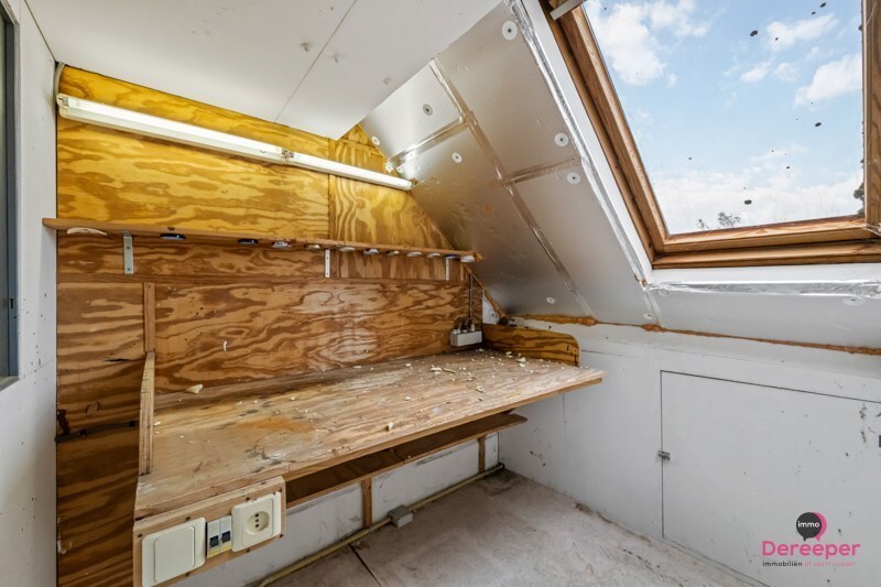 Te renoveren rijwoning op centrale ligging met leuke zuidgerichte tuin 