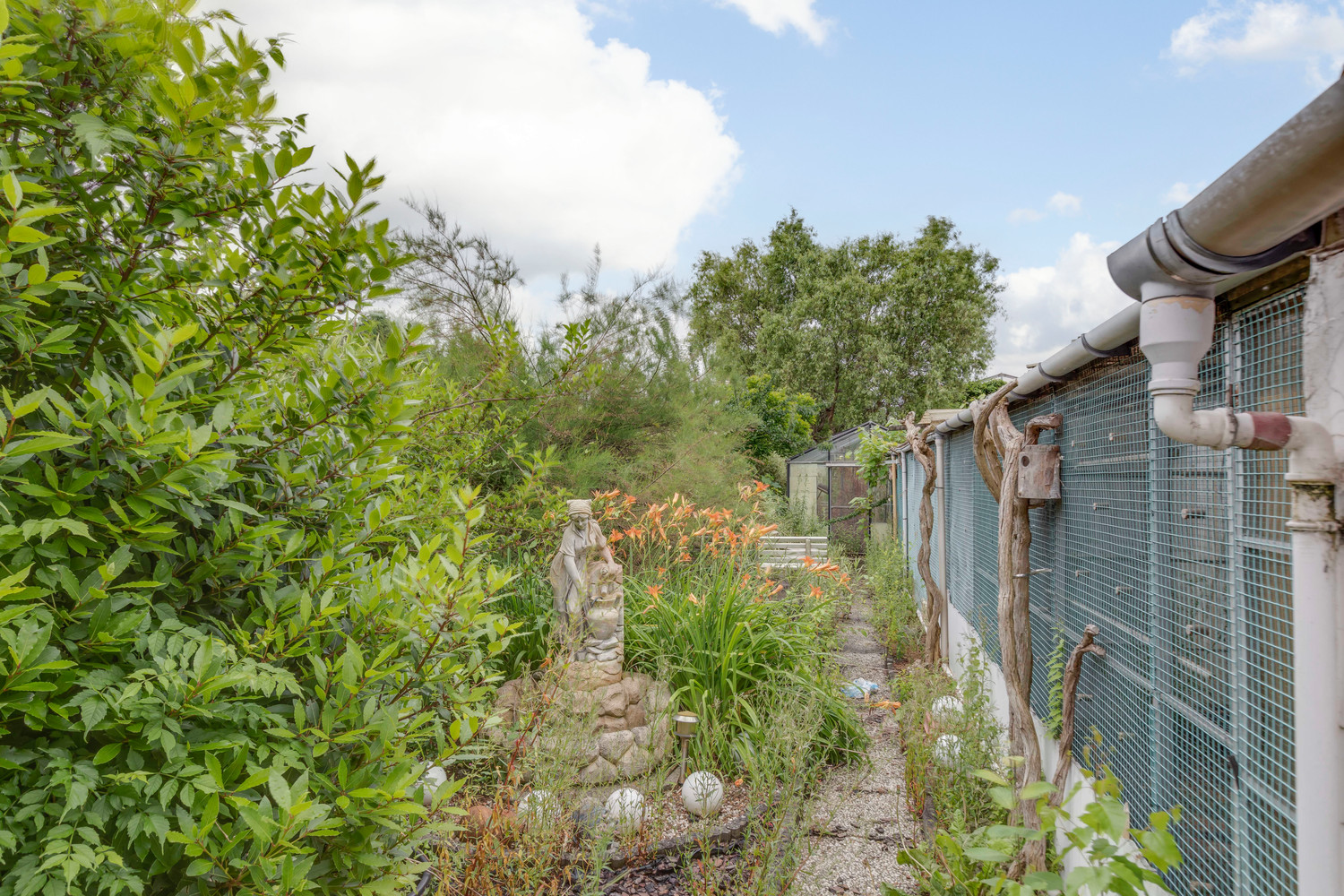 Buitenkans: rijwoning met tuin te Serskamp 