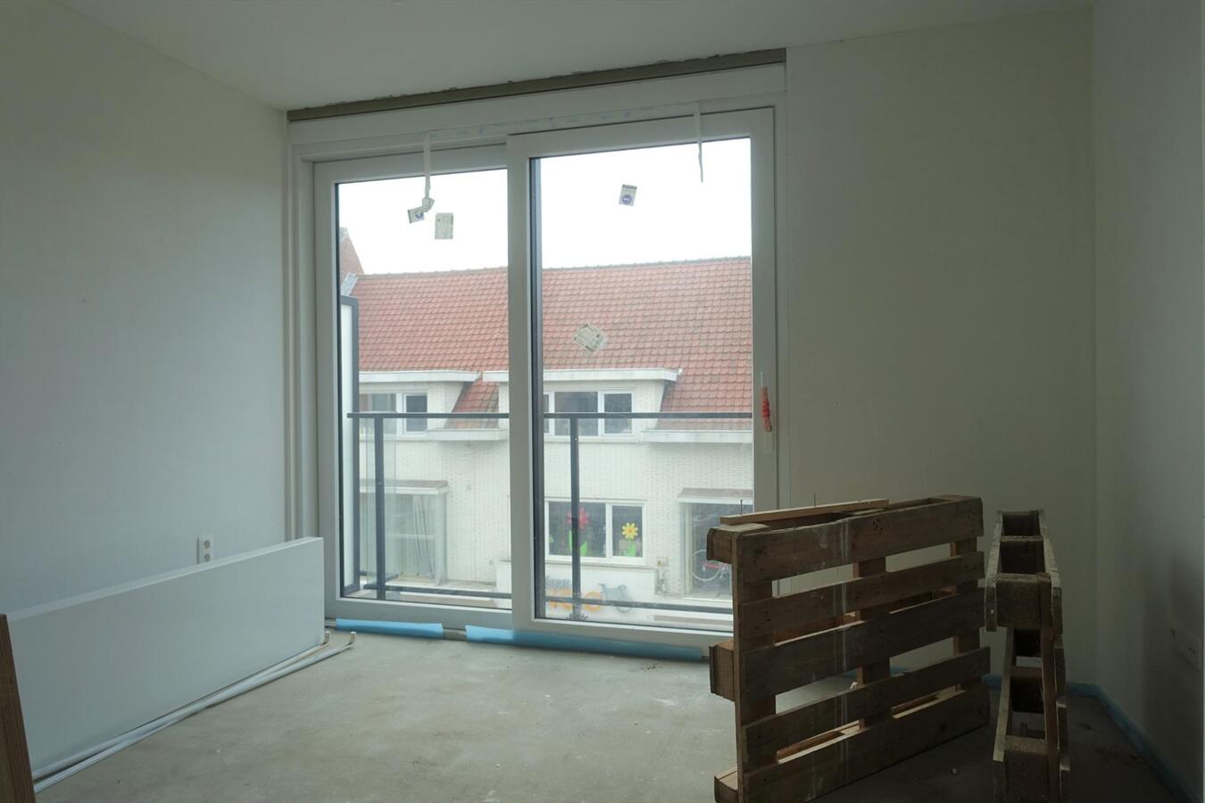 Hoek-assistentiewoning in nieuwbouwresidentie 