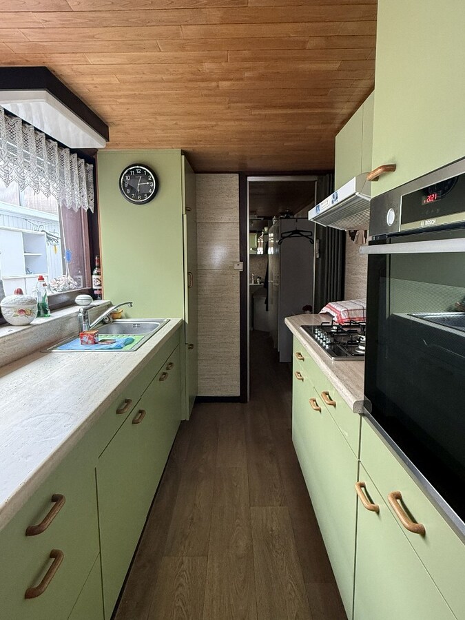 Te renoveren rijwoning met garage nabij het centrum van Avelgem 