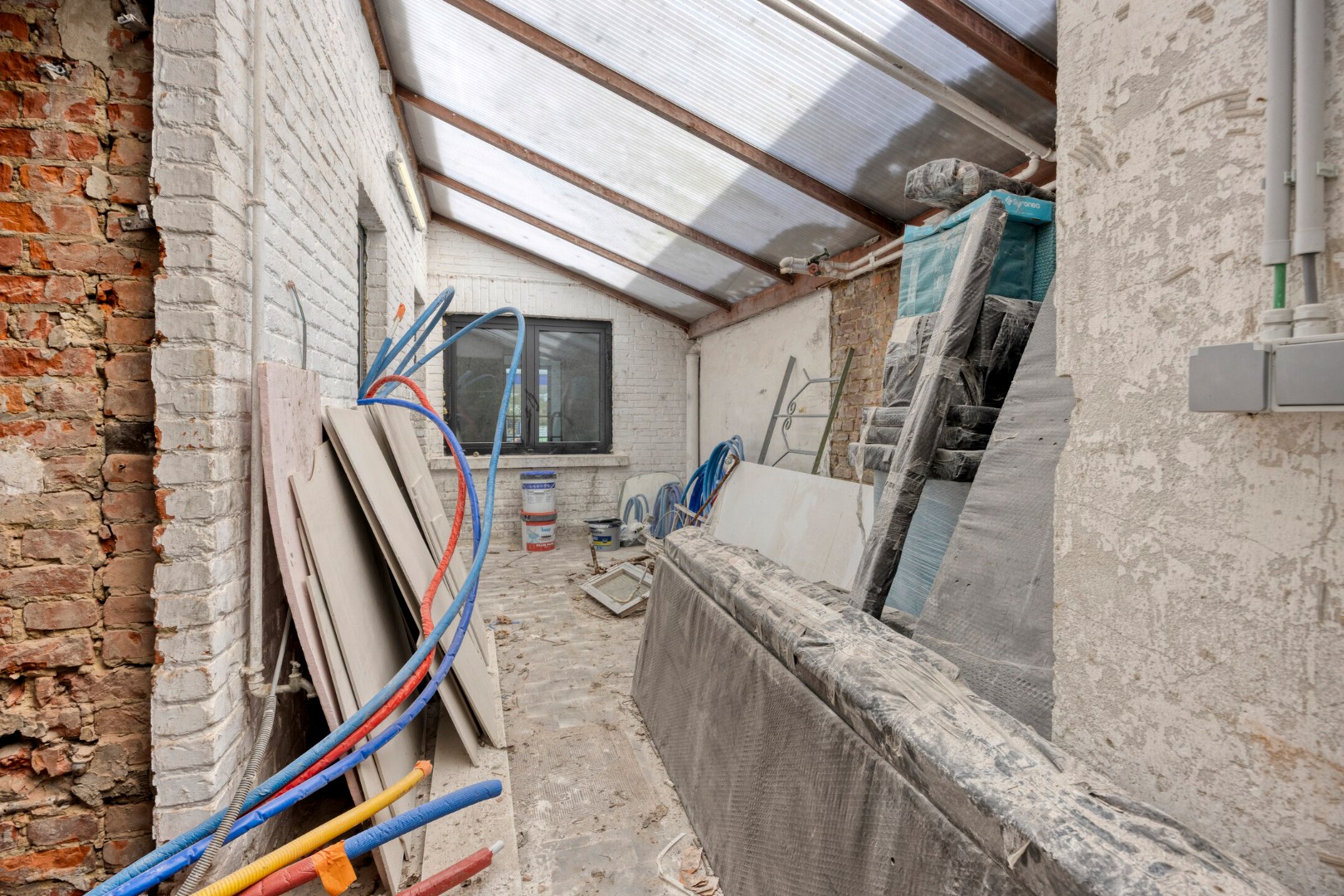 Gerenoveerd handelshuis met aangename tuin en garage op goede ligging in Herent 