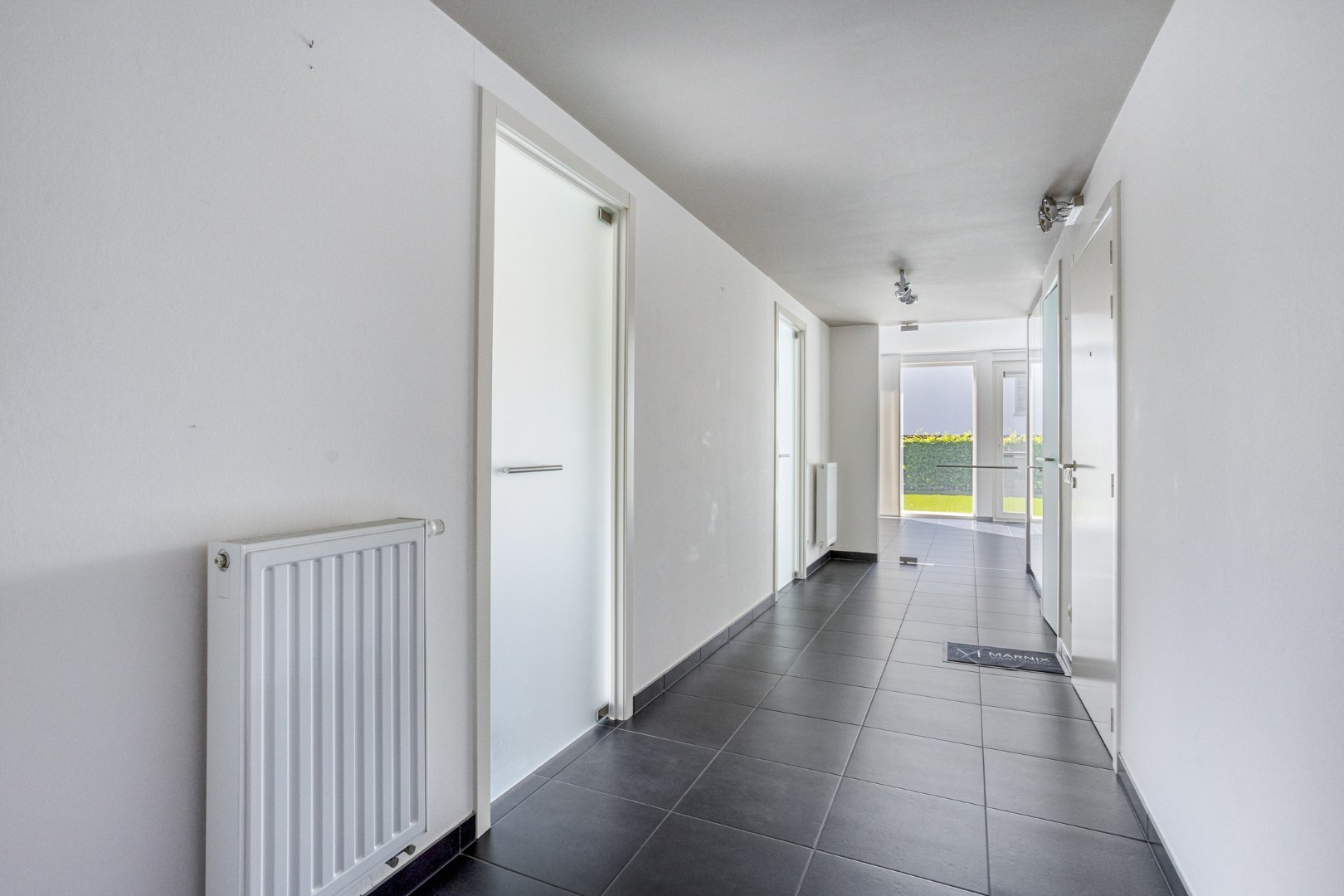 Instapklaar gelijkvloers appartement met groot terras, tuin en garagebox in Kumtich - EPC 104 KWH/m² 