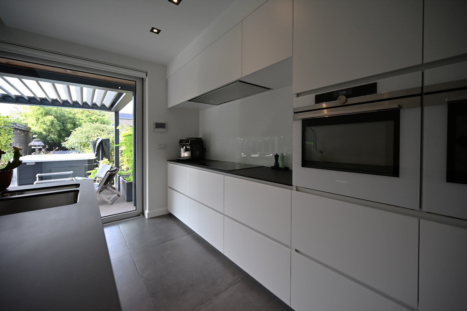 Instapklare woning met 3 slpks, garage, tuin én zonneterras te Kluizen 