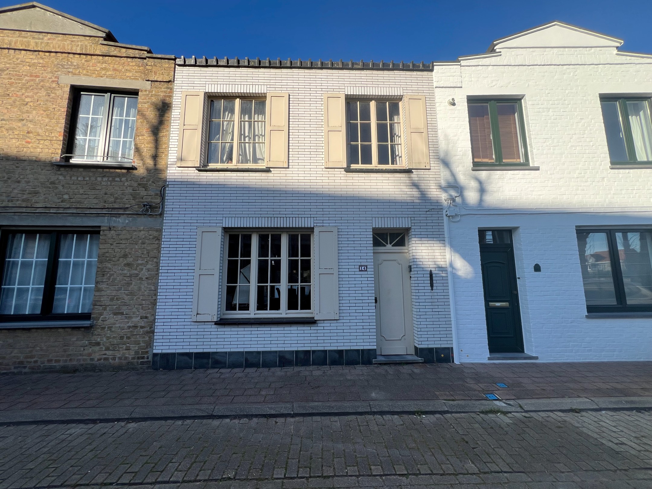 Te renoveren woning gelegen in het Oude Knokke met zuid- west gerichte tuin 