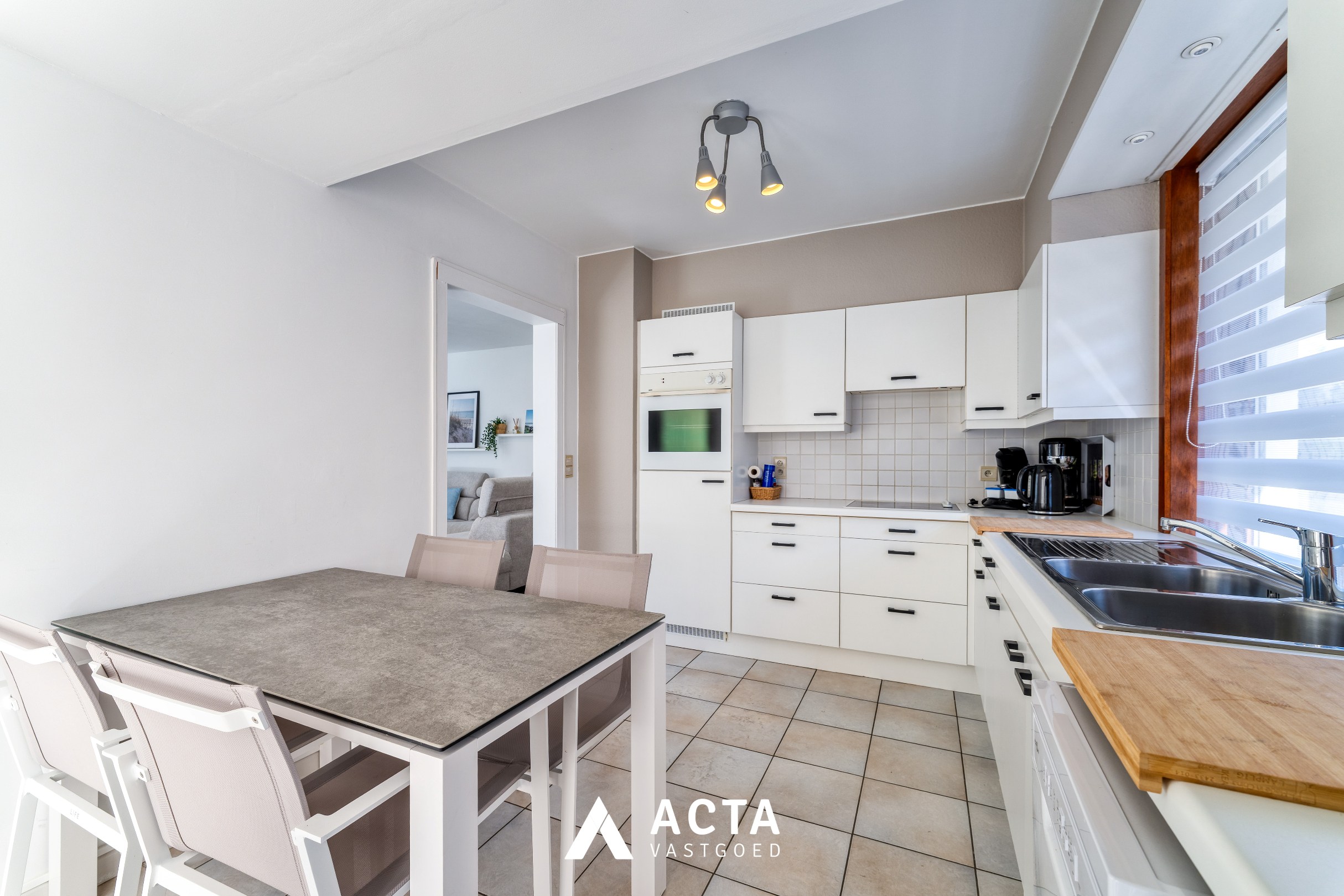 Gelijkvloers 3-slpk-appartement+tuin in Mariakerke 