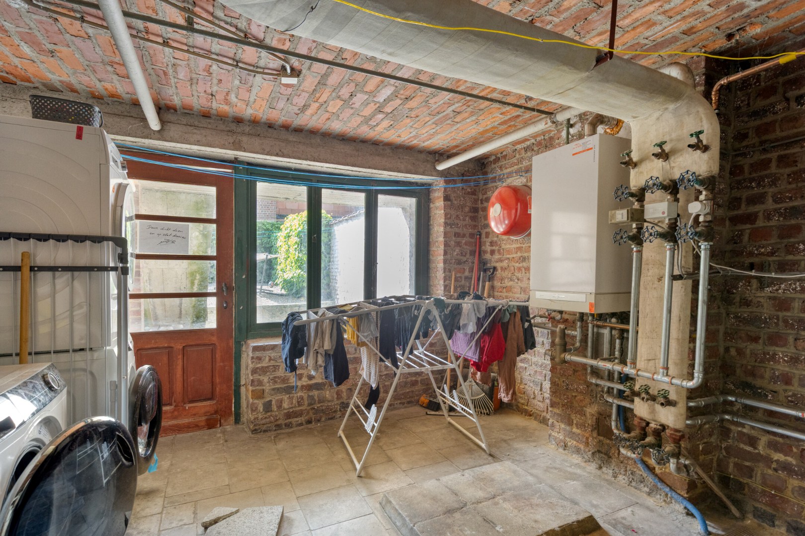 Super gelegen opbrengsteigendom bestaande uit 3 appartementen met tuin in het centrum van Tienen, EPC label C 
