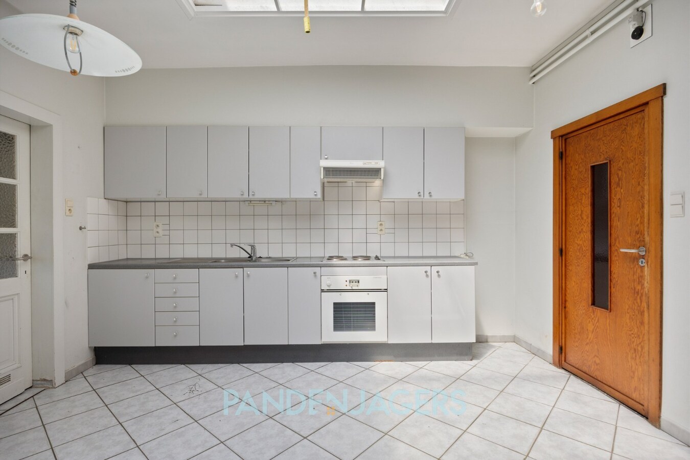 Rijwoning met diepe tuin en extra ingang voor de tuin te Duffel 