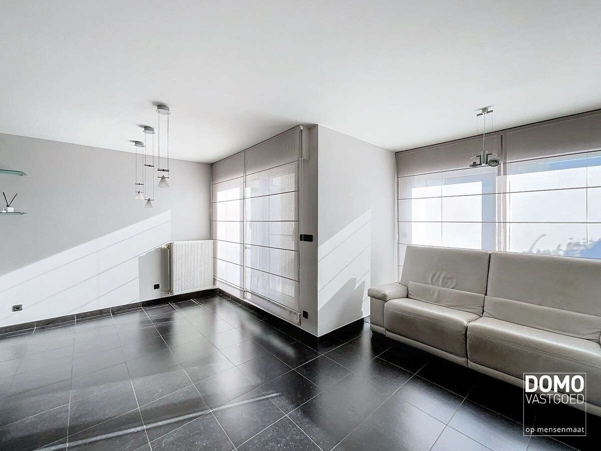 Duplex appartement met een gezellig tuintje, ondergrondse autostandplaats en 2 slaapkamers te Spalbeek - energielabel B, 109m² bewoonbare oppervlakte 