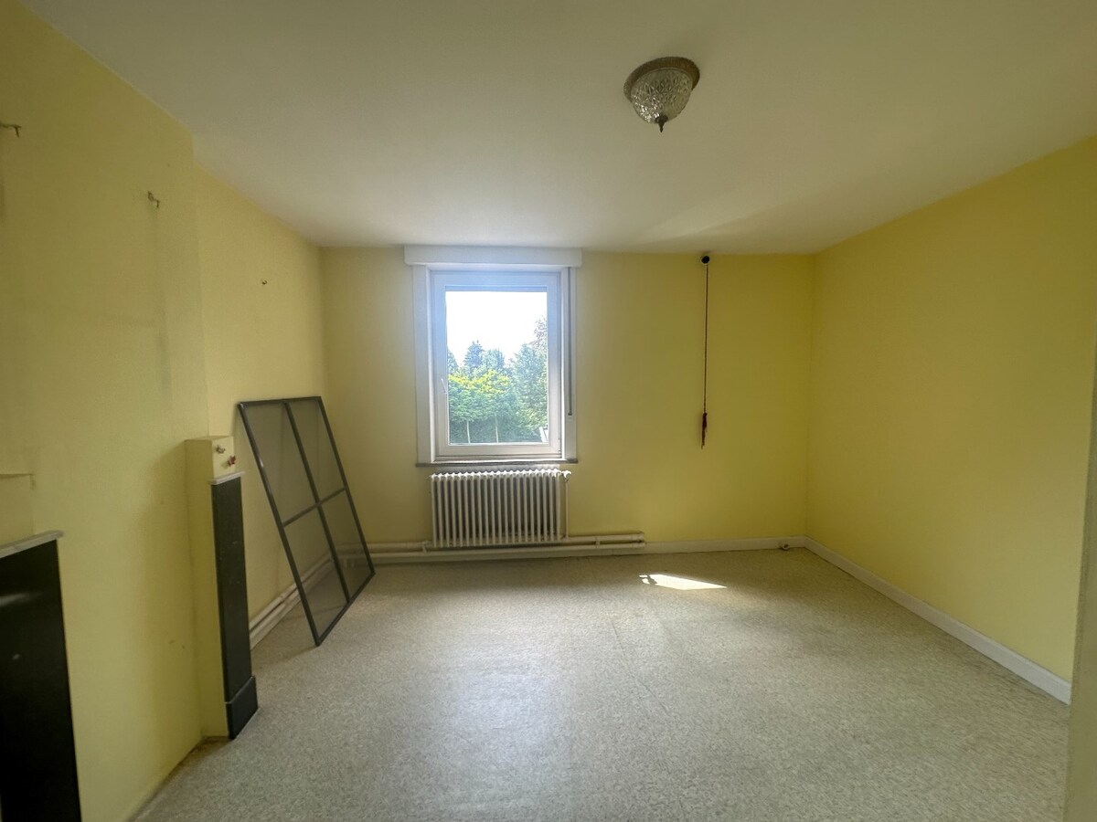 Halfopen woning met 3 slaapkamers op de Markt in Houthulst 