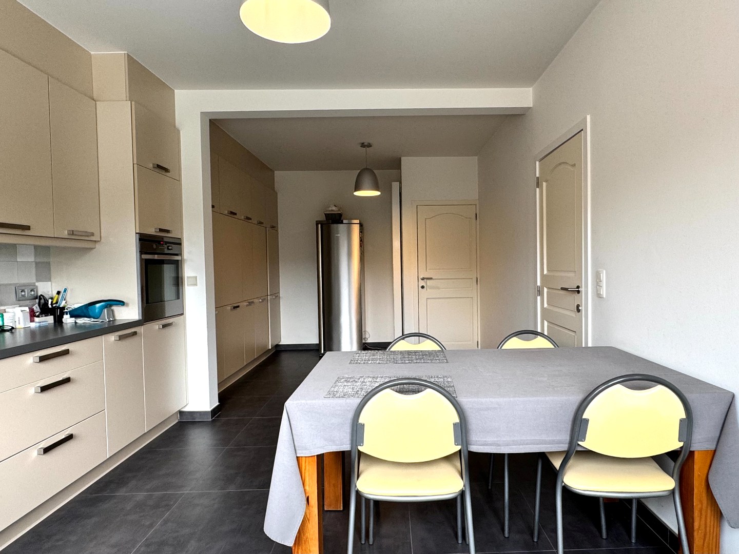 Instapklare halfopen bebouwing met 3 slaapkamers, tuin en garage te Zulte. 