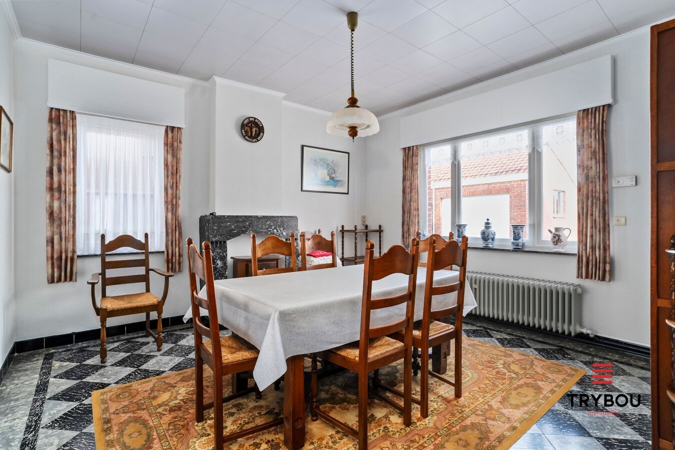 Degelijke woning op ruim perceel van 700m² 