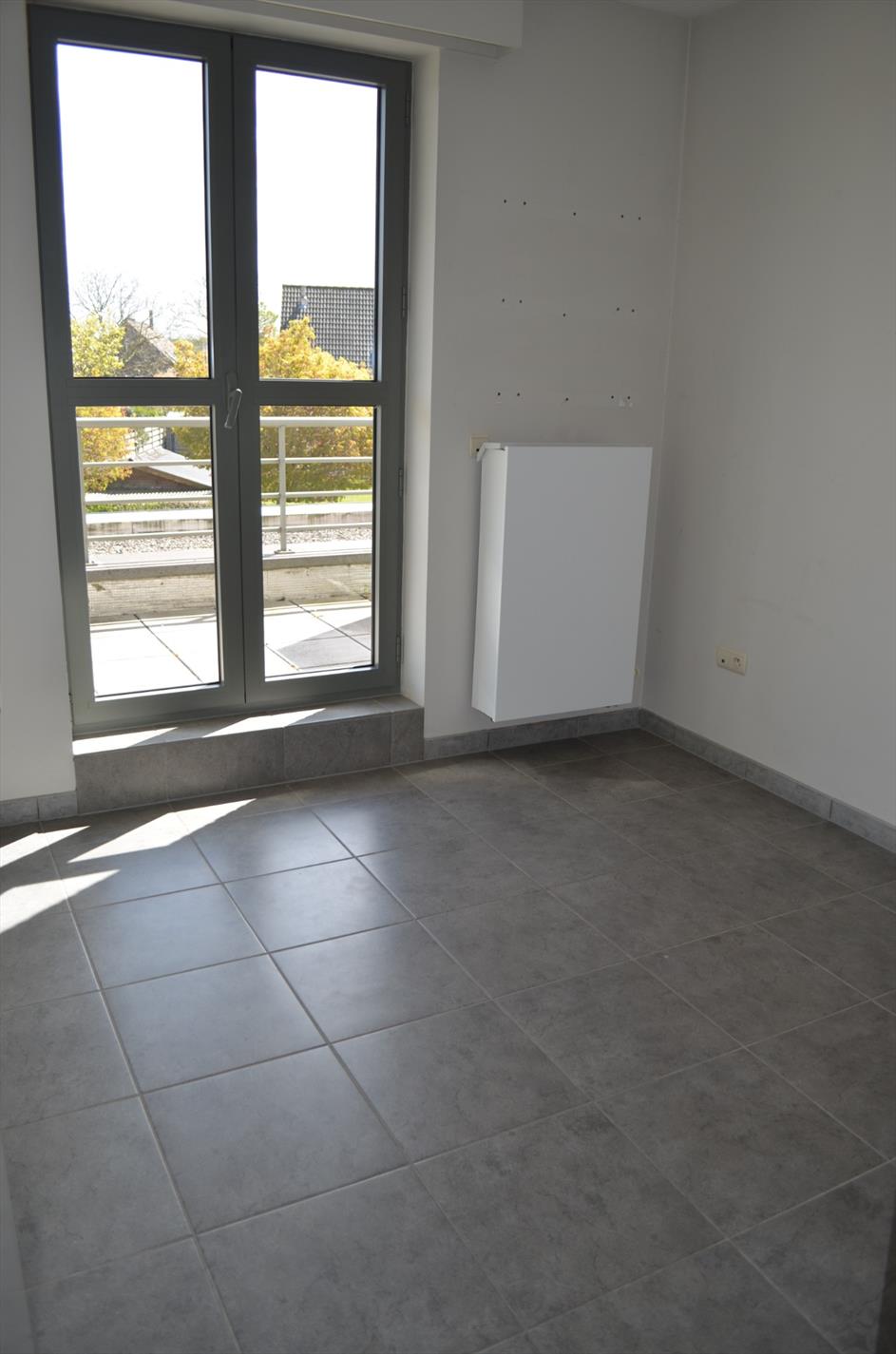 Recent app. met 2 slpks en garage te Lovendegem 