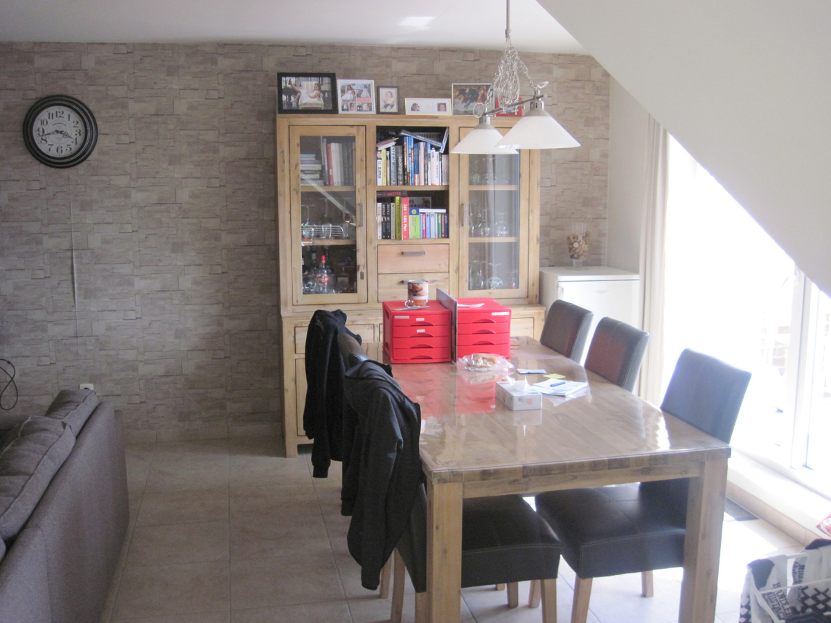 Bijzonder ruim 1-slp-appartement. Met terras. Met garage. 