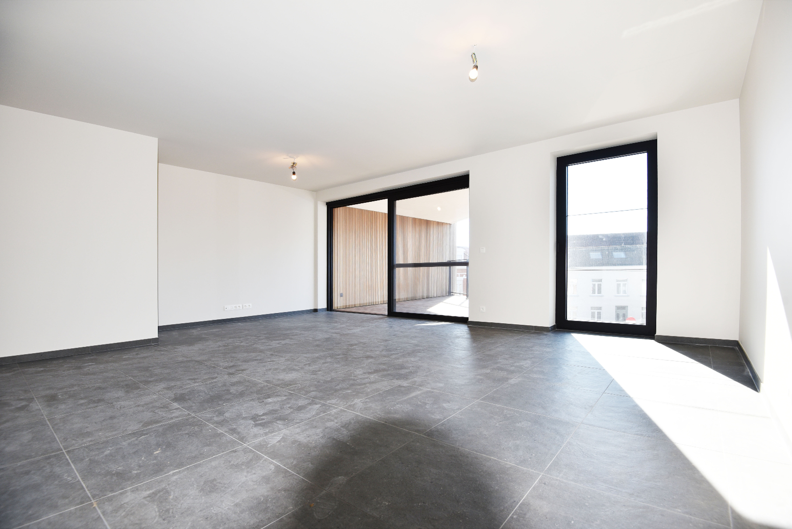 Nieuwbouwappartement, 2 slpks, autostaanplaats en terras te MALDEGEM centrum. 