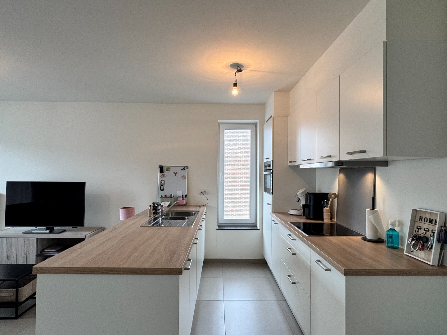 Recent appartement op de 2de verdieping met 2 terrassen en een autostaanplaats 