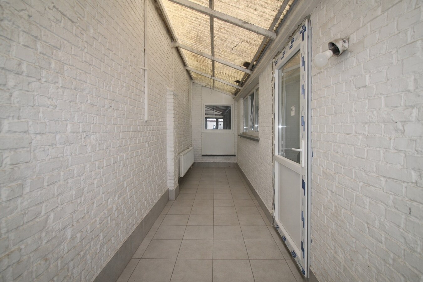 Te koop: Centraal gelegen woning met twee slaapkamers, zolderverdieping, EPC label C én tuin in Sint-Niklaas! 