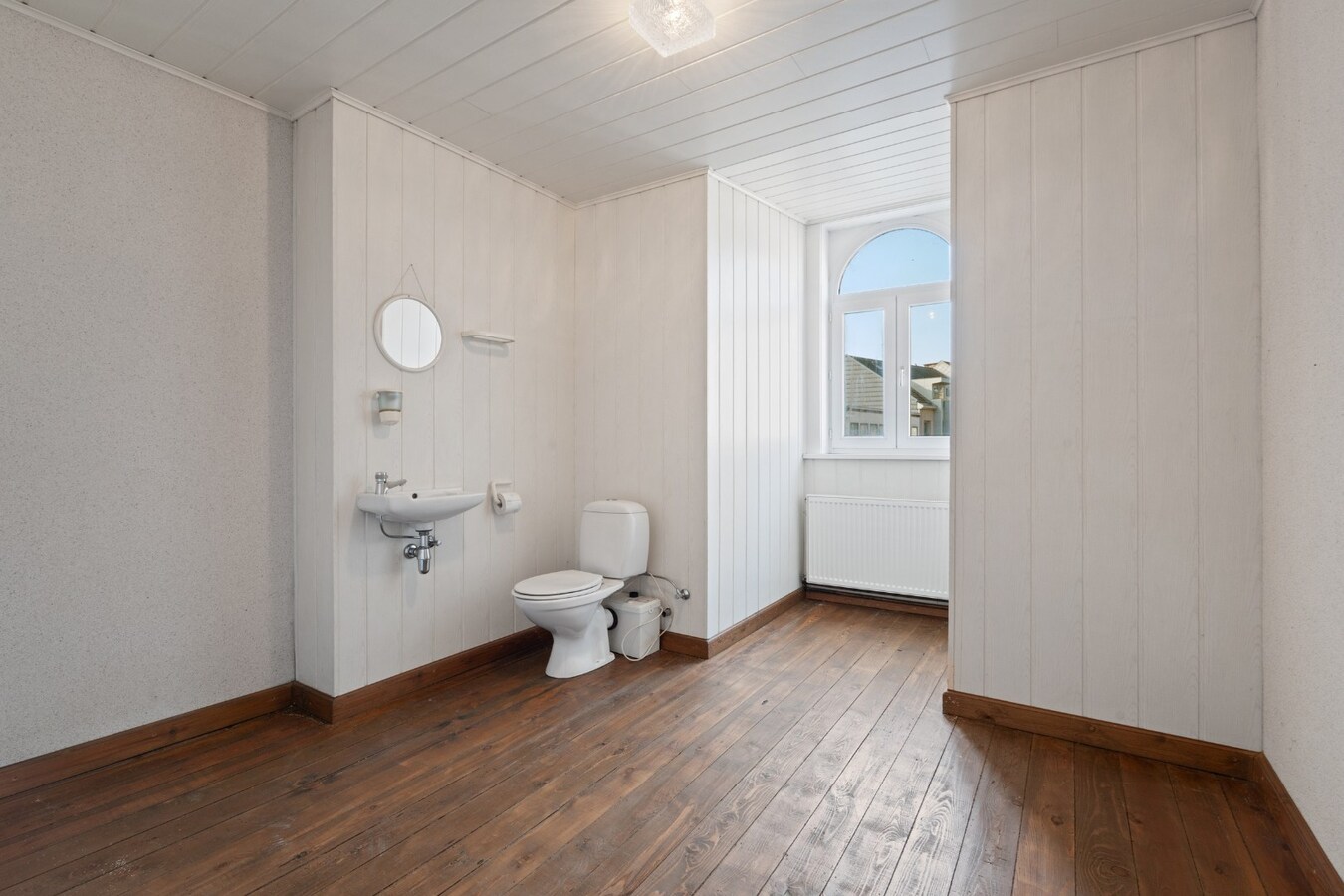 Handelswoning in centrum Zomergem! 