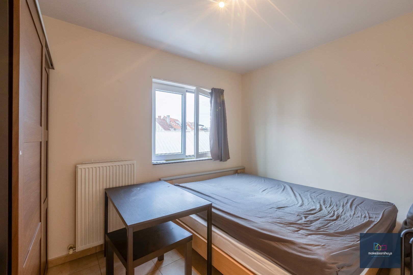 VERKOCHT Zeer verzorgd 1-slaapkamerappartement met terrasje en staanplaats 