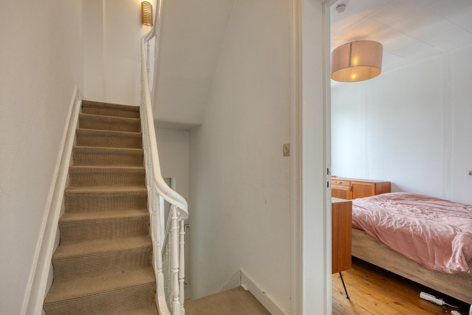Ruime stadswoning met achteruitgang via Janseniusstraat met 4 slaapkamers, garage en tuin te Leuven- EPC 239kwh/m2 